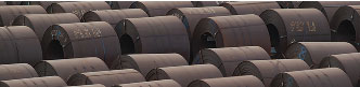 Roofing steel coil staged for a dark-color order
